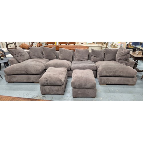 347 - MODULAR SOFA, of very large proportions with footstools, from Collins and Hayes 420cm W x 75cm H.