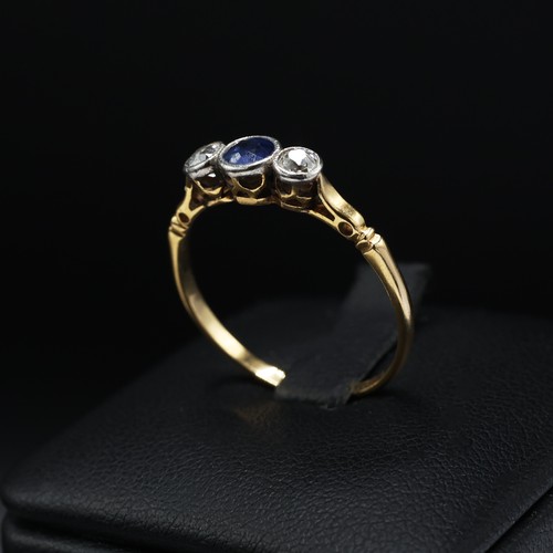 109 - A YELLOW METAL FIVE STONE DIAMOND DRESS RING, set with five graduated brilliant cut diamonds with a ... 