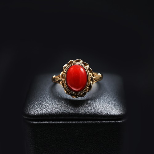 68 - A 9CT GOLD CORAL SET CABOCHON DRESS RING, ring size Q, together with an 18ct gold wedding band, ring... 