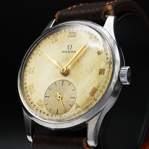 99 - OMEGA SUB SECOND WRISTWATCH, 34mm, 1947, champagne dial with roman numeral markers, 30T2 manual wind... 