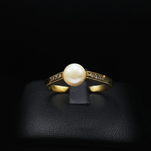 128 - TWO 18CT YELLOW GOLD DRESS RINGS, one set with a round cultured pearl and diamond shoulders, the oth... 