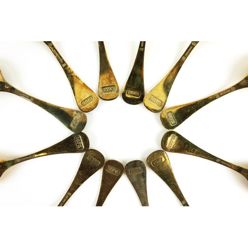 44 - GEORG JENSEN STERLING SILVER GOLD PLATED SPOONS, 13 with flower motif enamel inlay and late 20th cen... 