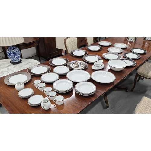 29 - CHRISTOFLE PART DINNER SERVICE, comprising 8 large metallic patterned rim plates, 3 metropolis dark ... 