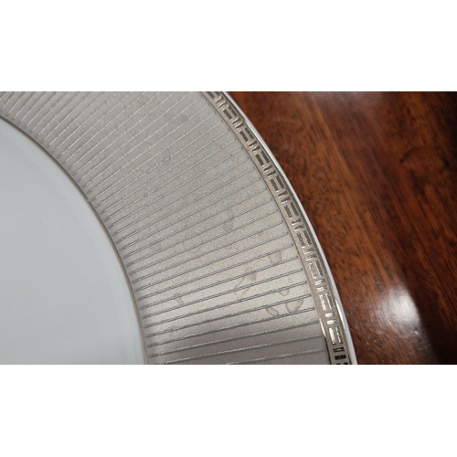 29 - CHRISTOFLE PART DINNER SERVICE, comprising 8 large metallic patterned rim plates, 3 metropolis dark ... 