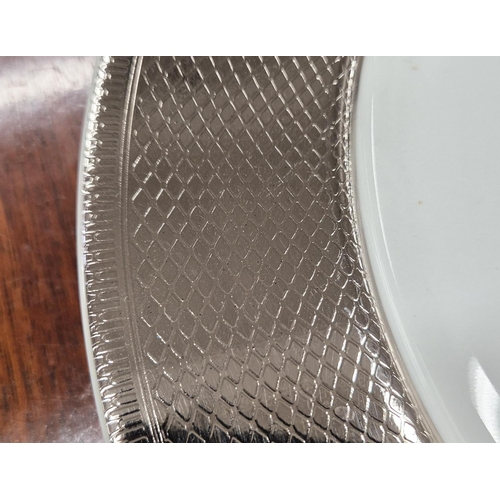 29 - CHRISTOFLE PART DINNER SERVICE, comprising 8 large metallic patterned rim plates, 3 metropolis dark ... 