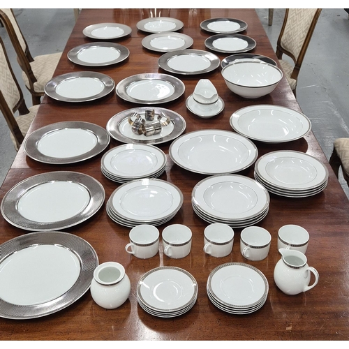 29 - CHRISTOFLE PART DINNER SERVICE, comprising 8 large metallic patterned rim plates, 3 metropolis dark ... 