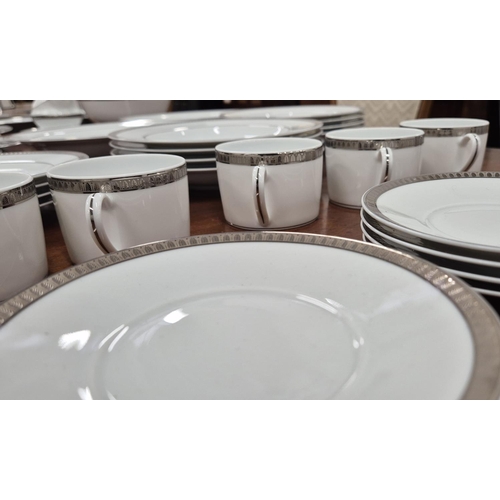 29 - CHRISTOFLE PART DINNER SERVICE, comprising 8 large metallic patterned rim plates, 3 metropolis dark ... 