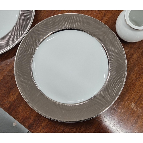 29 - CHRISTOFLE PART DINNER SERVICE, comprising 8 large metallic patterned rim plates, 3 metropolis dark ... 