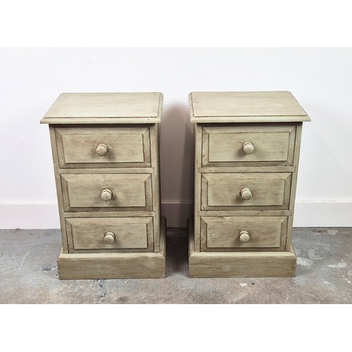 298 - BEDSIDE CHESTS, a pair, grey painted, each with three drawers, 61cm H x 38cm x 30cm. (2)