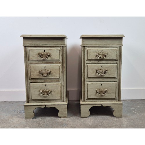 294 - BEDSIDE CHESTS, a pair, early 20th century and later grey painted, each with three drawers, 67cm H x... 