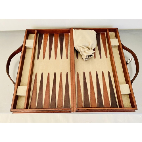 601 - TRAVELLING BACKGAMMON SET, tan leathered case, 23cm W x 40cm D x 7cm H.