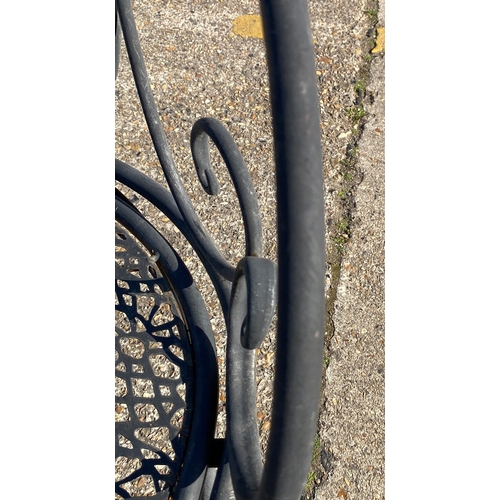 152 - REGENCY STYLE BLACK METAL GARDEN BENCH. 80cm H x 130cm W x 55cm D.