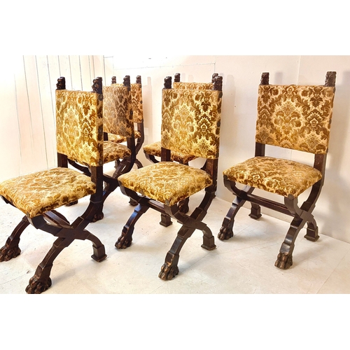 242 - SET OF SIX GOTHIC STYLE EBONISED WALNUT DINING CHAIRS. Late 19th century Continental, with carved he... 