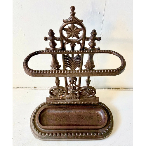 243 - CAST IRON UMBRELLA STAND. 60cm H x 43cm W x 20cm D.