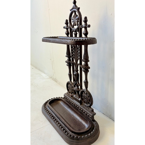243 - CAST IRON UMBRELLA STAND. 60cm H x 43cm W x 20cm D.