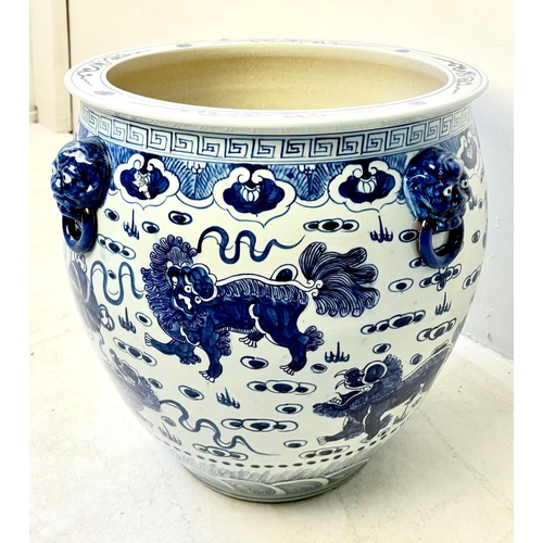 244 - CHINESE BLUE AND WHITE CERAMIC PLANTER. with lion decoration, 43cm H x 43cm W.
