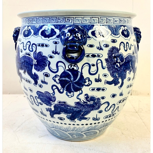 244 - CHINESE BLUE AND WHITE CERAMIC PLANTER. with lion decoration, 43cm H x 43cm W.