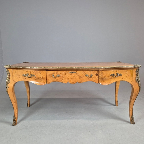 269 - LOUIS XV STYLE BURR VENEERED AND BRASS MOUNTED BUREAU PLAT. tan leather top above three drawers, 82c... 