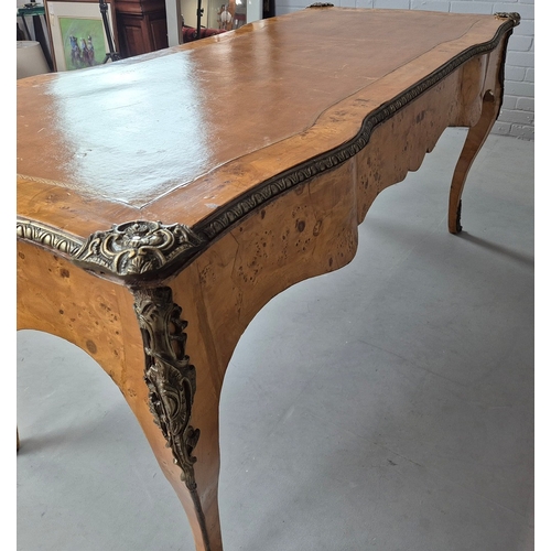 269 - LOUIS XV STYLE BURR VENEERED AND BRASS MOUNTED BUREAU PLAT. tan leather top above three drawers, 82c... 
