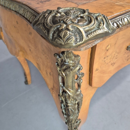 269 - LOUIS XV STYLE BURR VENEERED AND BRASS MOUNTED BUREAU PLAT. tan leather top above three drawers, 82c... 