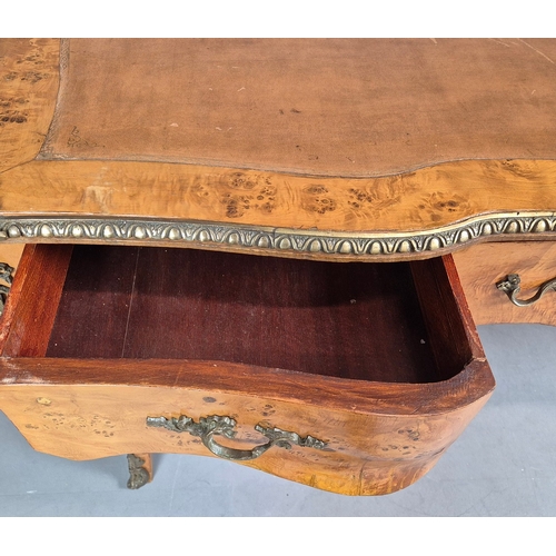 269 - LOUIS XV STYLE BURR VENEERED AND BRASS MOUNTED BUREAU PLAT. tan leather top above three drawers, 82c... 