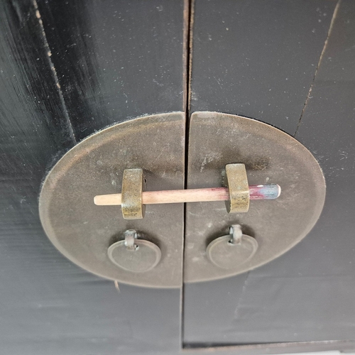 270 - CHINESE BLACK LACQUER SIDEBOARD. three drawers above four doors, 91cm H x 151cm W x 47cm D.