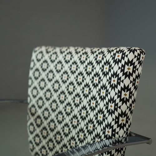 273 - SWIVEL DESK CHAIR. aluminium in patterned fabric with height adjustable seat, 55cm W x 88cm-99cm H.