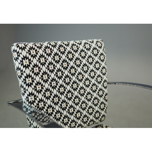 273 - SWIVEL DESK CHAIR. aluminium in patterned fabric with height adjustable seat, 55cm W x 88cm-99cm H.