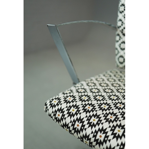 273 - SWIVEL DESK CHAIR. aluminium in patterned fabric with height adjustable seat, 55cm W x 88cm-99cm H.