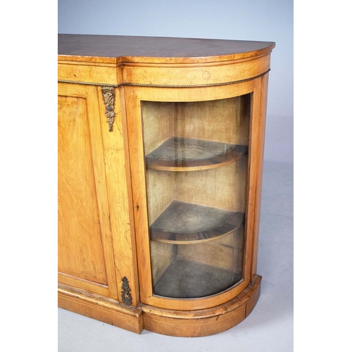 282 - VICTORIAN WALNUT, BURR WALNUT, INLAID AND BRASS MOUNTED CREDENZA. panel door flanked by bowed glazed... 