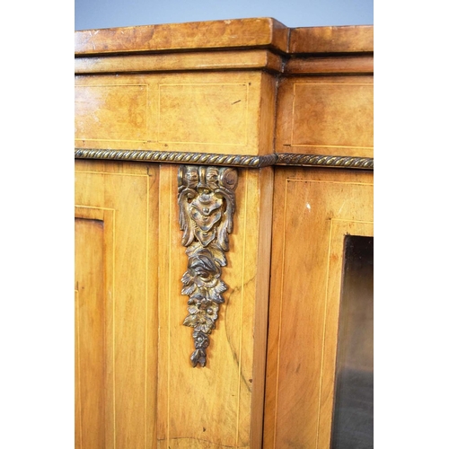 282 - VICTORIAN WALNUT, BURR WALNUT, INLAID AND BRASS MOUNTED CREDENZA. panel door flanked by bowed glazed... 