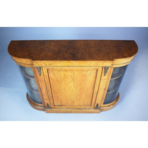 282 - VICTORIAN WALNUT, BURR WALNUT, INLAID AND BRASS MOUNTED CREDENZA. panel door flanked by bowed glazed... 