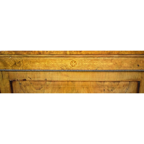 282 - VICTORIAN WALNUT, BURR WALNUT, INLAID AND BRASS MOUNTED CREDENZA. panel door flanked by bowed glazed... 