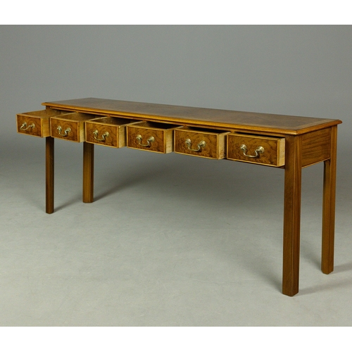 290 - GEORGIAN STYLE WALNUT HALL TABLE. With six drawers
77cm H x 168cm W x 32cm D.