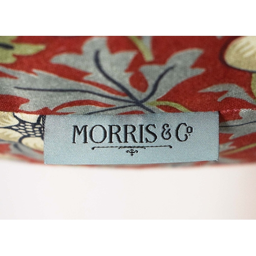 303 - WILLLIAM MORRIS POUFFES, A PAIR. bears label, each 51cm w x 35cm d.