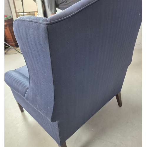 310 - WINGBACK CHAIR AND FOOTSTOOL (2). in blue herringbone fabric 76cm w x 103cm t and a small footstool ... 