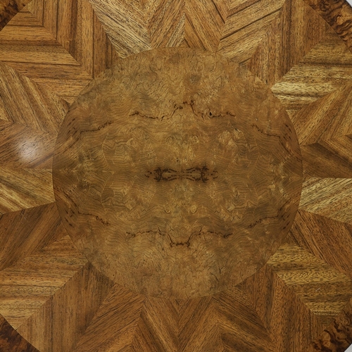 314 - CIRCULAR COFFEE TABLES (2). a nesting pair, with circular wooden parquetry tops on metal supports, t... 