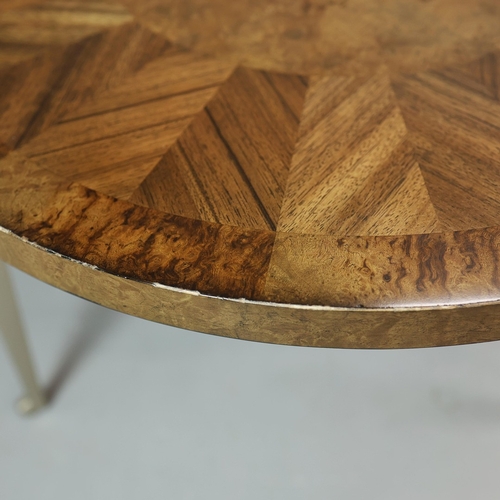 314 - CIRCULAR COFFEE TABLES (2). a nesting pair, with circular wooden parquetry tops on metal supports, t... 