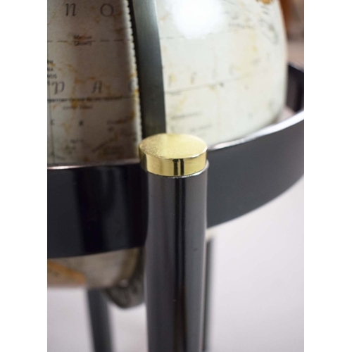 315 - A FLOOR GLOBE. mounted on a chrome and brass frame. c.1970's. 85cm h x 55cm w.