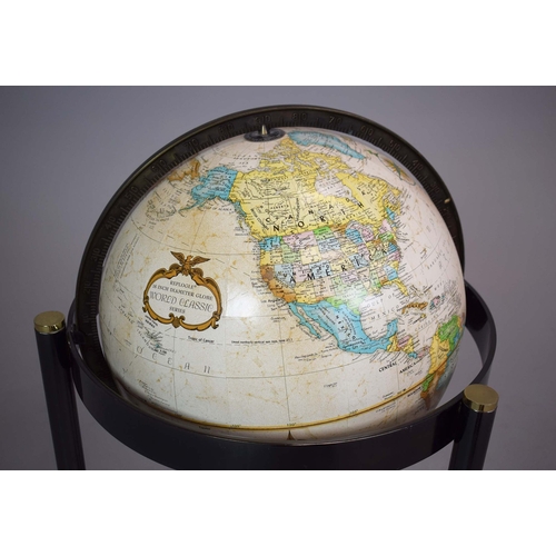 315 - A FLOOR GLOBE. mounted on a chrome and brass frame. c.1970's. 85cm h x 55cm w.