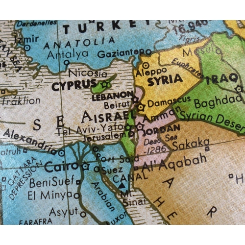 315 - A FLOOR GLOBE. mounted on a chrome and brass frame. c.1970's. 85cm h x 55cm w.