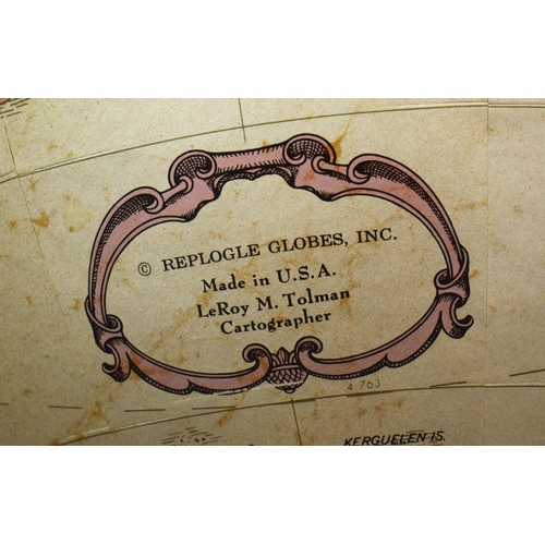 315 - A FLOOR GLOBE. mounted on a chrome and brass frame. c.1970's. 85cm h x 55cm w.