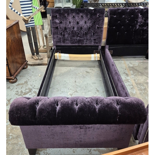 323 - PAIR OF SINGLE BED FRAMES. in buttoned purple velvet each 100cm w x 105cm t.