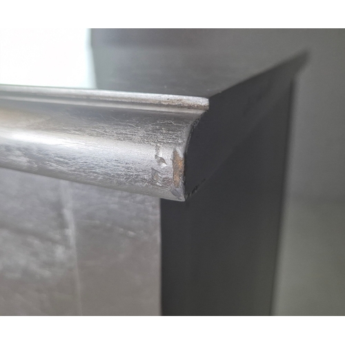 324 - SILVERED TALL CHEST. of serpentine form 65cm w x 46cm d x 137cm t.