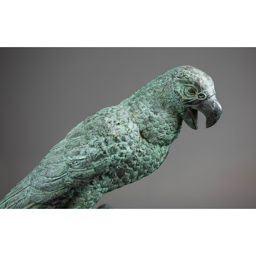 336 - CONTEMPORARY SCHOOL SCULPTURAL STUDY OF PARROT ON BRANCH. cast metal, 124cm H approx.