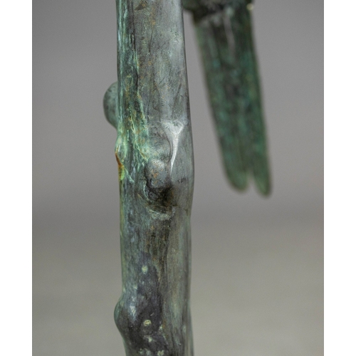 336 - CONTEMPORARY SCHOOL SCULPTURAL STUDY OF PARROT ON BRANCH. cast metal, 124cm H approx.