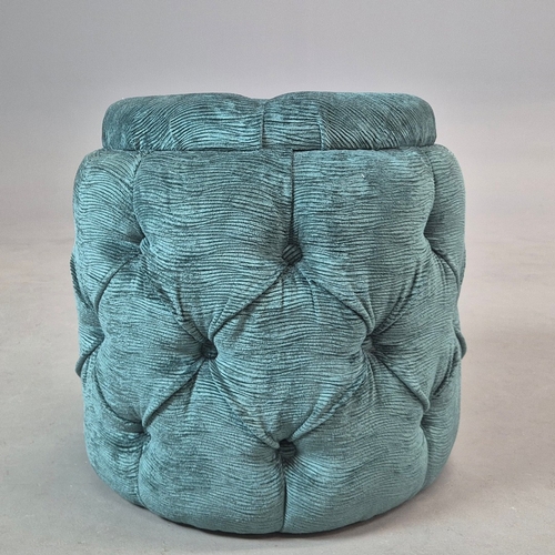 338 - OTTOMAN. turquoise velvet 57cm w x 49cm t.