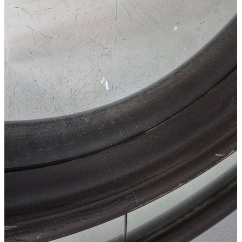 339 - CONVEX MIRROR. eglomise, with a wooden show frame and border, possibly by Julian Chichester 88cm w.