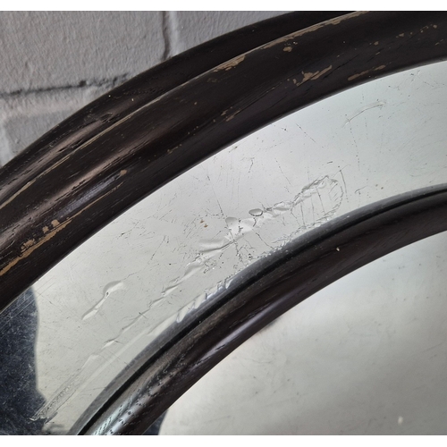 339 - CONVEX MIRROR. eglomise, with a wooden show frame and border, possibly by Julian Chichester 88cm w.