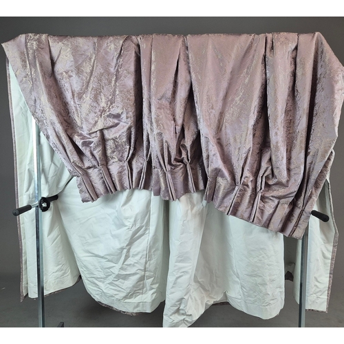 341 - CURTAINS, A PAIR. lilac patterned fabric, each curtain 175cm w gaythered by 253 cm d.